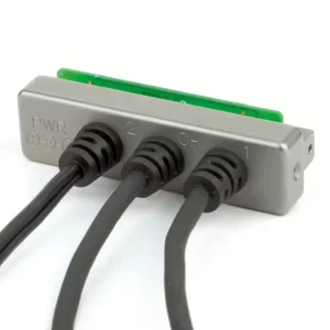 Lectrosonics SRHARNESS Audio and Power Adapter for SR Receivers: The adapter panel with its three cables.