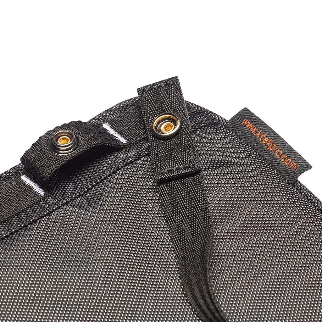 K-Tek KGBLXP Stingray Gizmo-X Bag (Large, Purple Interior): a MOLLE strap and snap on the back, close up.