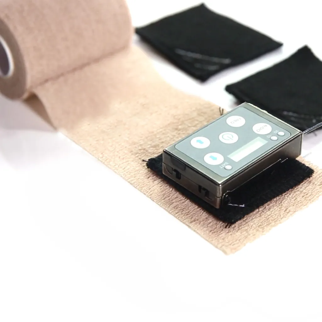 K-Tek KSHBPC Stingray HeatBlock Pieces (Set of 6): under a transmitter taped to the body with a skin-tone bandage.