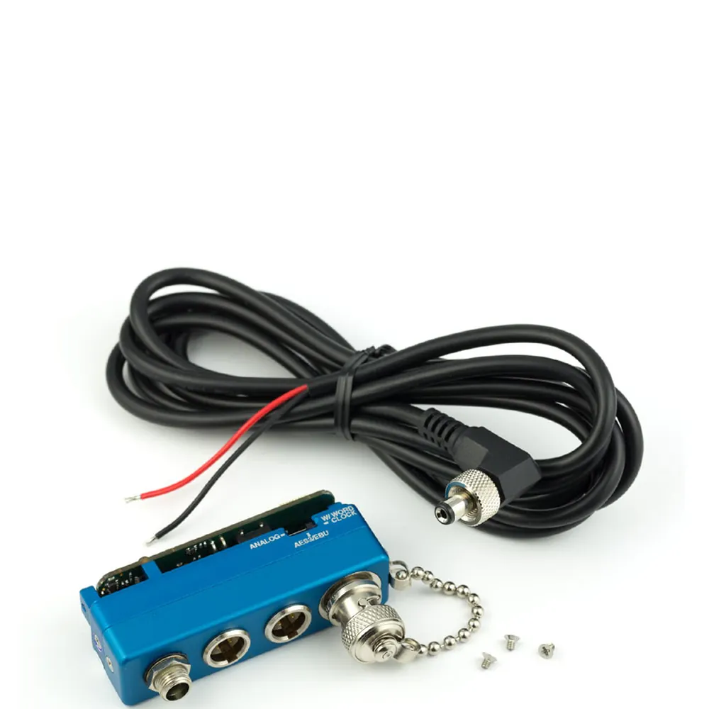 Lectrosonics SRAES3 Audio Output Adapter for SR Series Receivers: The adapter with its power cord and screws.