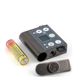 Lectrosonics SMWB Single-Battery Wideband Belt-Pack Transmitter: The transmitter beside an AA battery and its removed battery door.