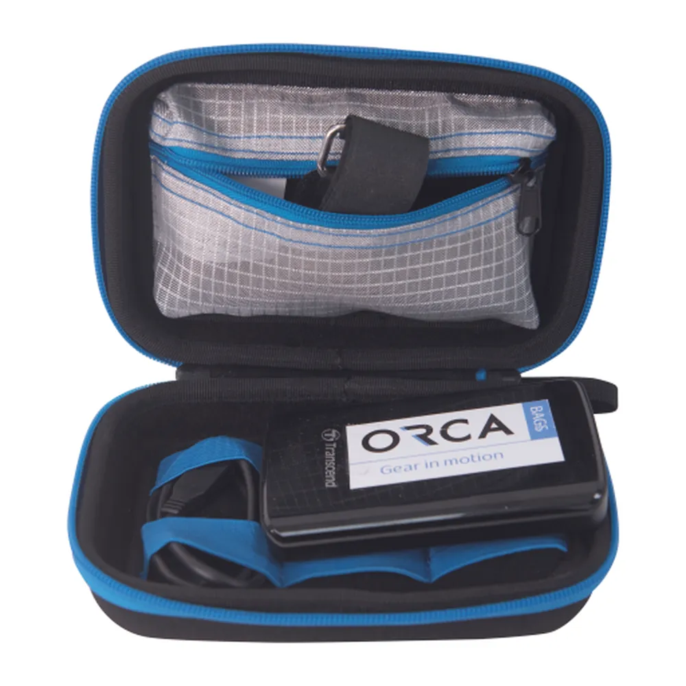ORCA OR-65 Hard Shell Accessories Case (Extra Small): opened, holding a light.