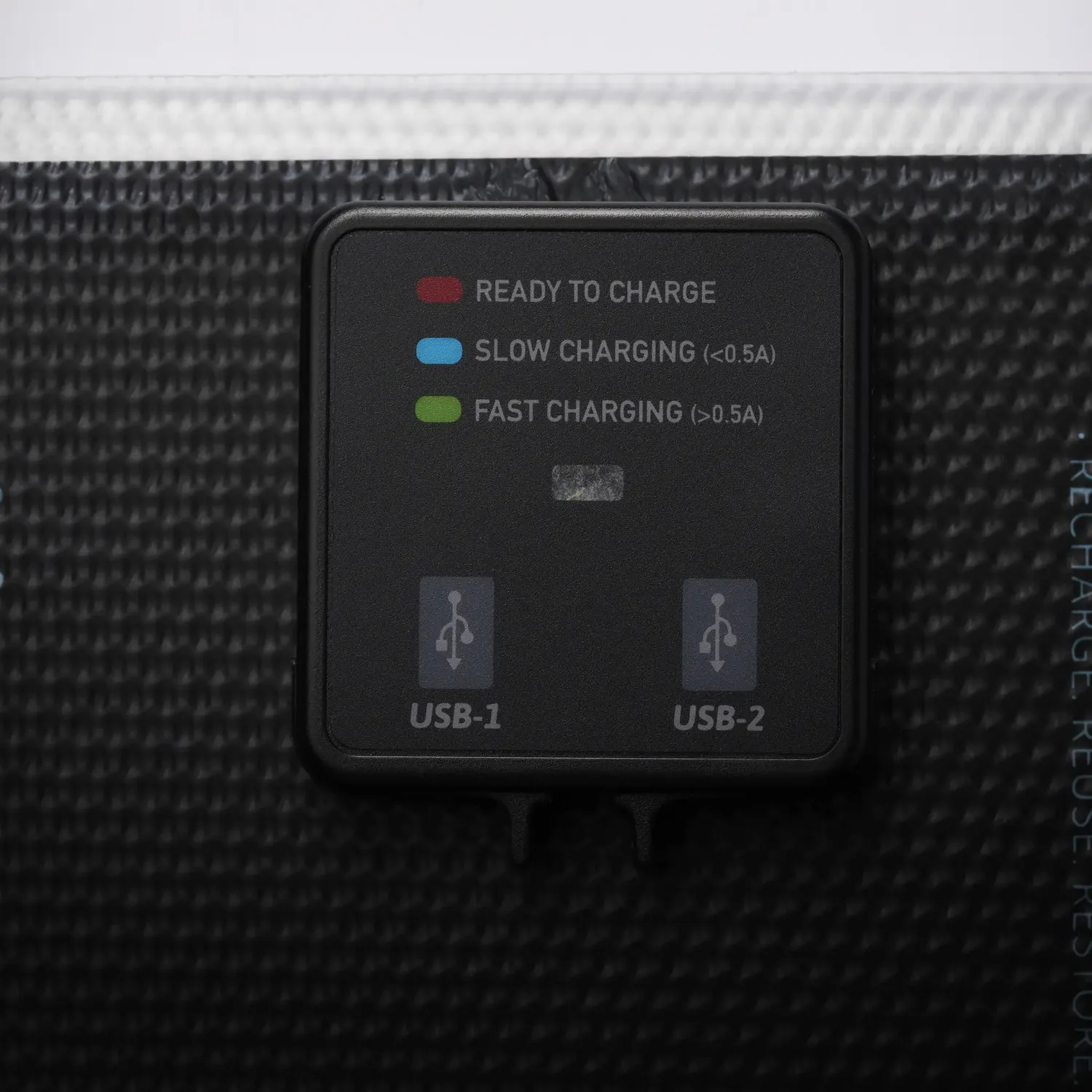 Paleblue Approach 2 Triple-Panel Solar Charger port box with two USB ports and the ready, slow charging, and fast charging indicator lights.