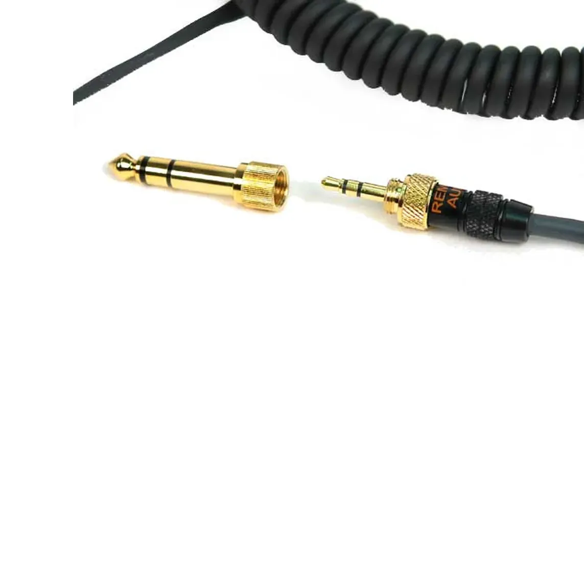 Remote Audio 7506CC Coiled Cable for 7506 Headphones: The 3.5 mm plug and the included 1/4 in adapter.