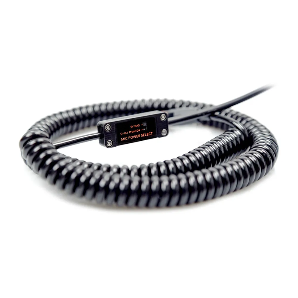 Remote Audio Universal Headsets: the black coiled headset cable laid in a loop, with the in-cable mic housing near its end.