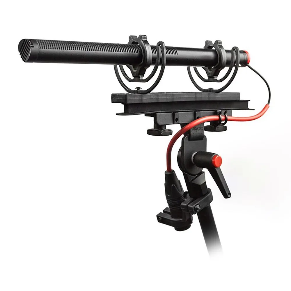 Rycote Windshield Kit 416 for Sennheiser MKH 416: A shotgun mic in the red Lyre suspension on a boom pole.