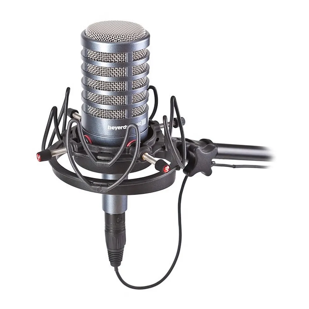 Rycote InVision USM Universal Studio Shock Mount: USM holding a mic with a silver grille.