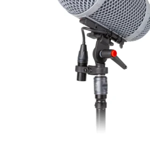 Rycote Classic Adaptor for PCS-Boom Connector up close under a Modular windshield, with its XLR holder and red-tipped lever above a PCS-Boom Connector.