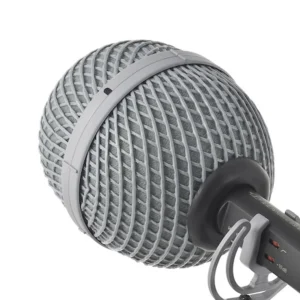 Rycote BBG Windshield for Short Microphones: The BBG windshield on a microphone, its two gray halves joined around the capsule.