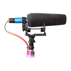 Rycote INV-Lite Shock Mount for Short Shotgun Microphones: The INV-Lite holding a short shotgun with a foam windscreen.
