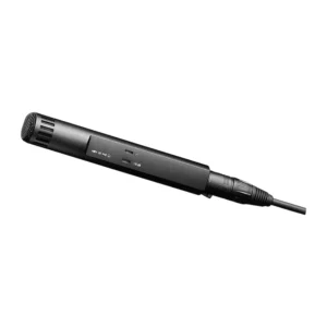 Sennheiser MKH 50 P48 Condenser Microphone: The MKH 50 P48 lying at an angle, its switch panel showing the roll-off and -10 dB switches.
