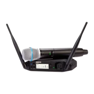 Shure GLXD24+/B87A Dual-Band Digital Wireless Handheld System: The Beta 87A handheld resting on the GLXD4+ tabletop receiver.