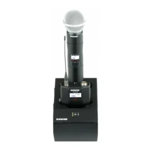 Shure SBC200 Dual Docking Charger: The SBC200 with a handheld transmitter docked.