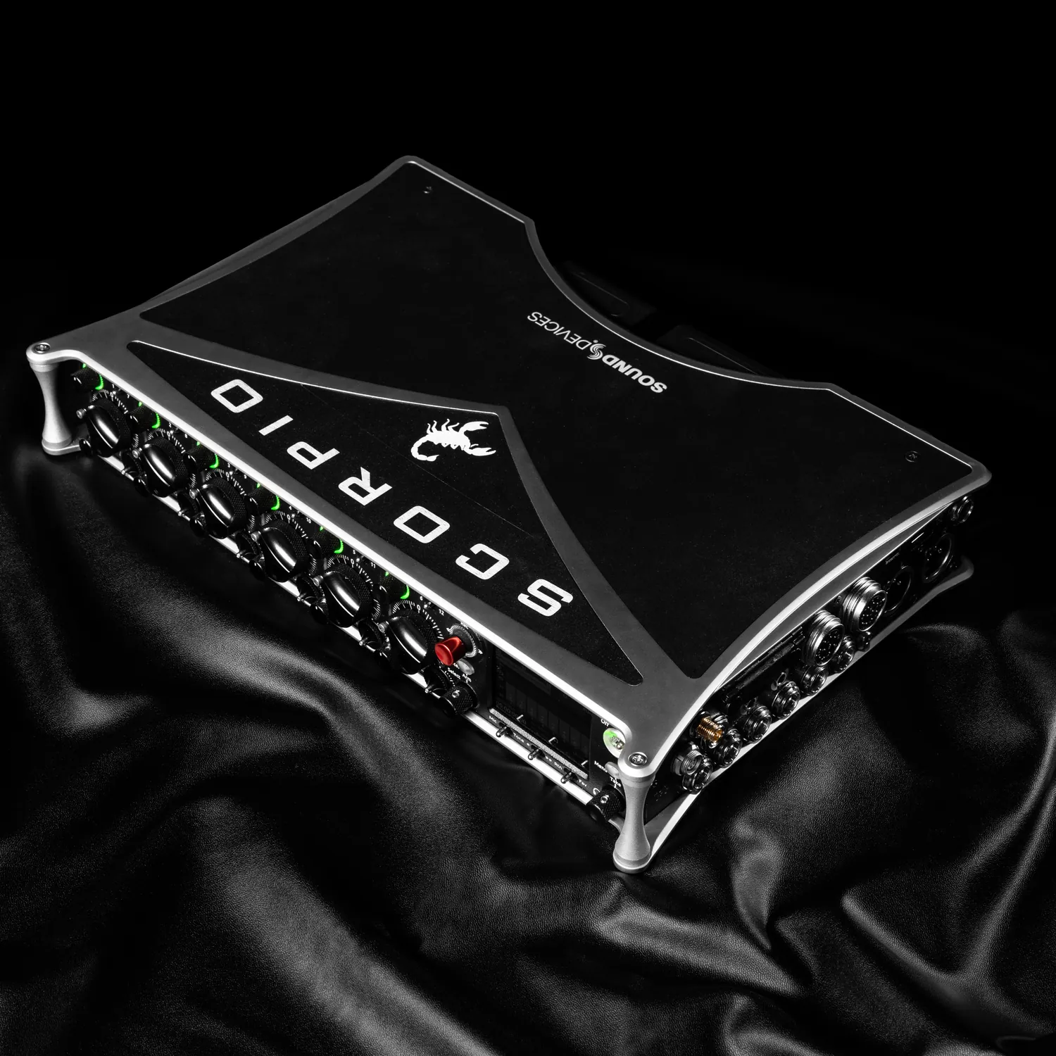 Sound Devices Scorpio Portable Mixer-Recorder: The Scorpio at an angle on black fabric.