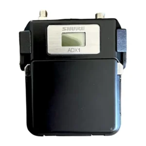 Sound Guys Solutions ADX1 Metal Belt Clip, front of a Shure ADX1 transmitter held in the sleeve.