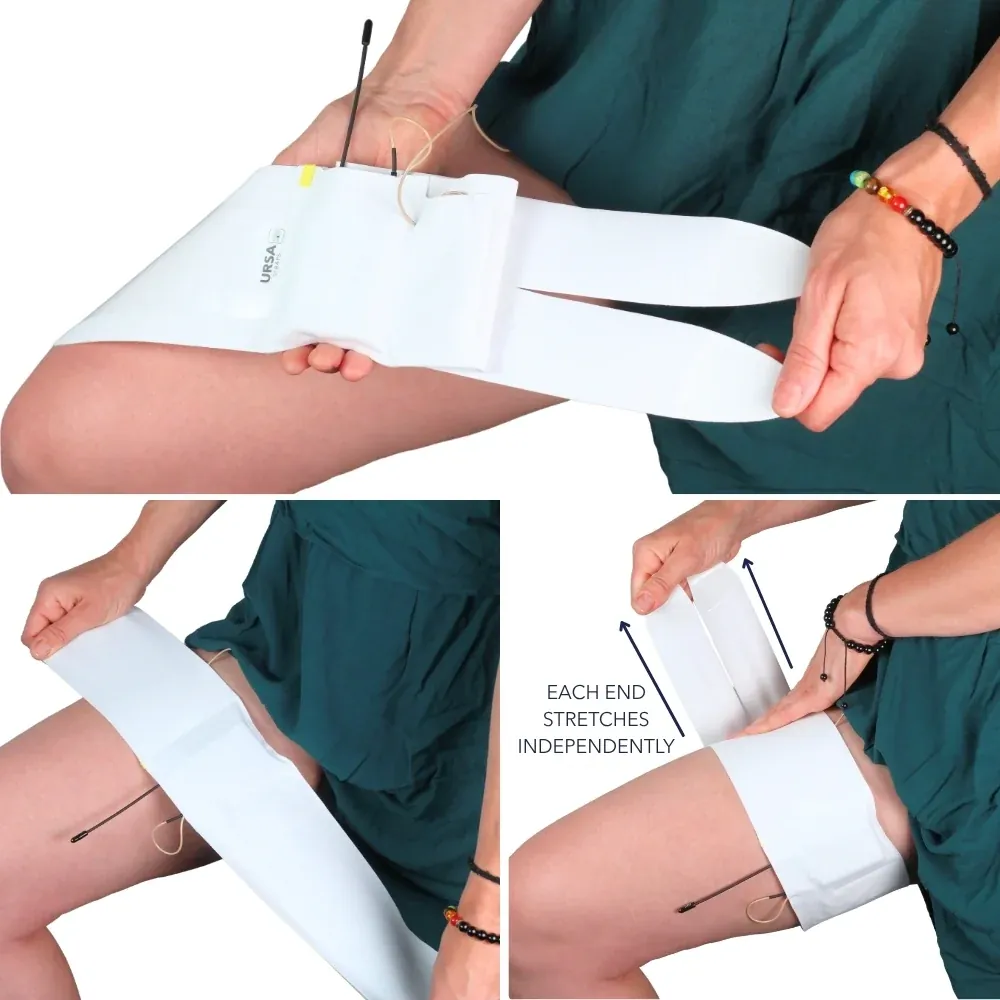 URSA Thigh Strap in white held open to show its two split ends, then wrapped around the thigh with each end stretched on its own.