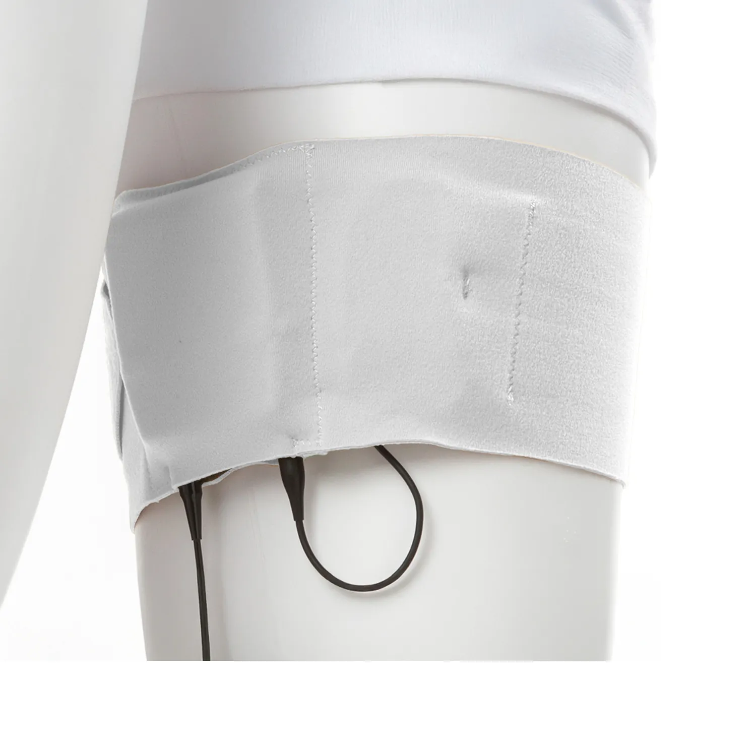 Viviana Straps Extreme Thigh (Vertical Pouch) in white, worn around a mannequin's thigh with a transmitter in the pouch and its cable looped below.