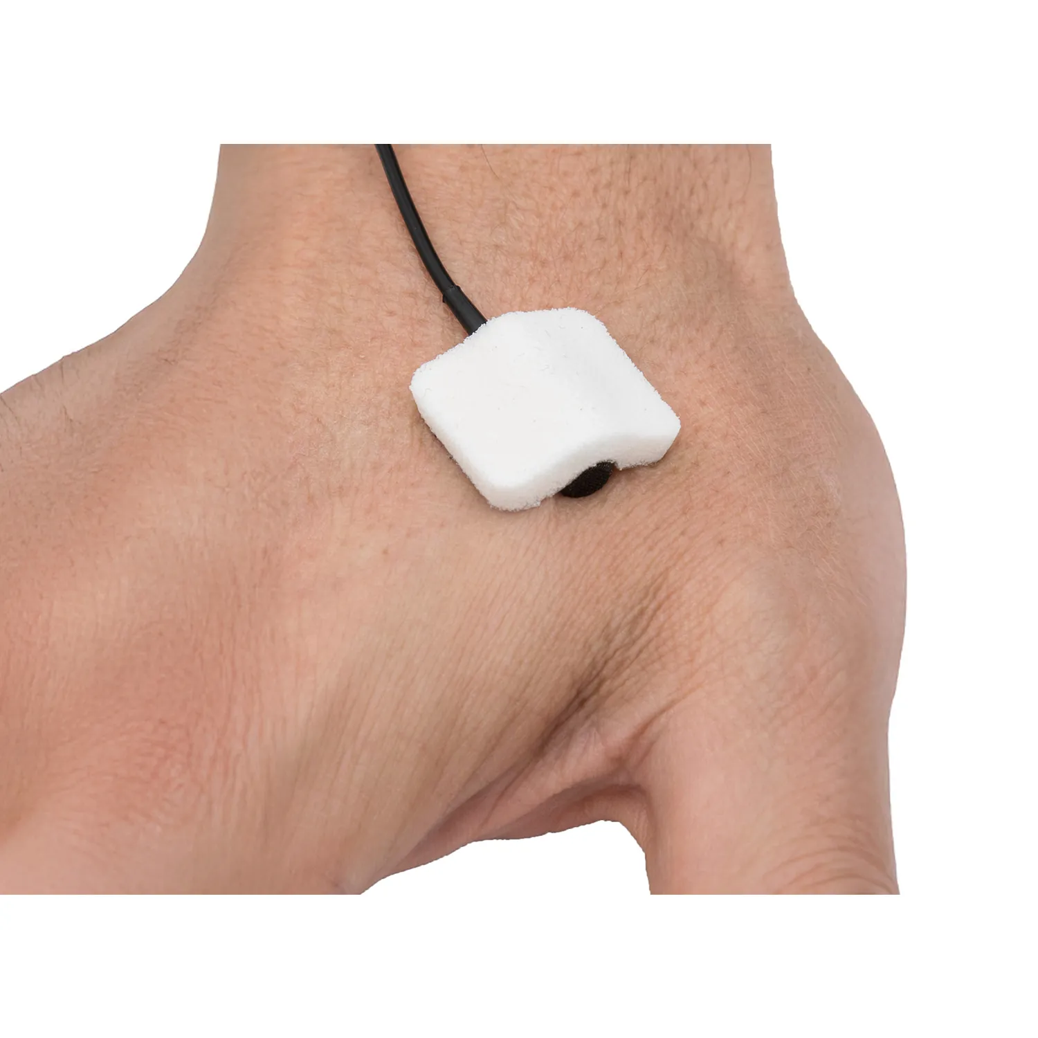 Viviana Pad (Pack of 30): pad holding a lav mic on skin.
