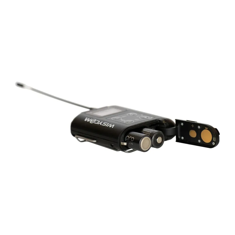 Wisycom MTP60 Multiband Bodypack Transmitter: The MTP60 with its battery door open and two AA batteries.