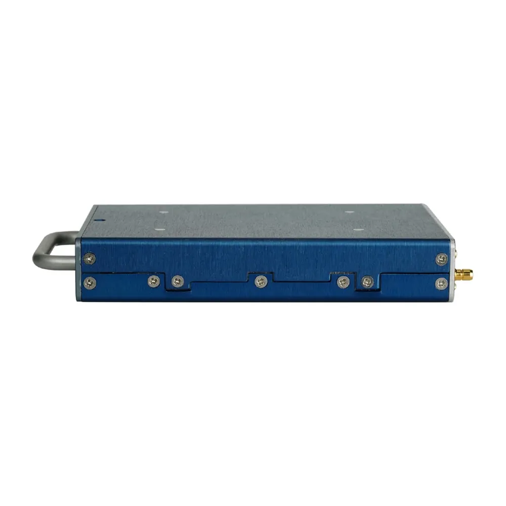 Zaxcom MRX414 Module Receiver: The MRX414 from the side, with its pull handle and an SMA connector.