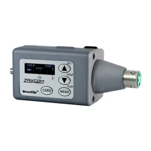 Zaxcom TRX745 Digital Plug-on Transmitter: The TRX745 with a 3-pin XLR cone fitted, at an angle, with its display and buttons.